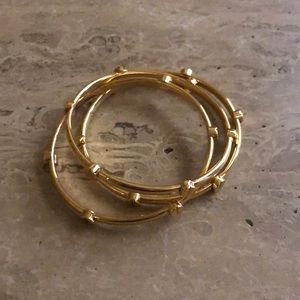 Set of FOUR, gold bangle bracelets